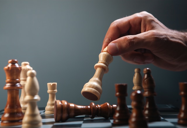 Chess board mid-game, representing the strategic positioning behind a small business capital decision