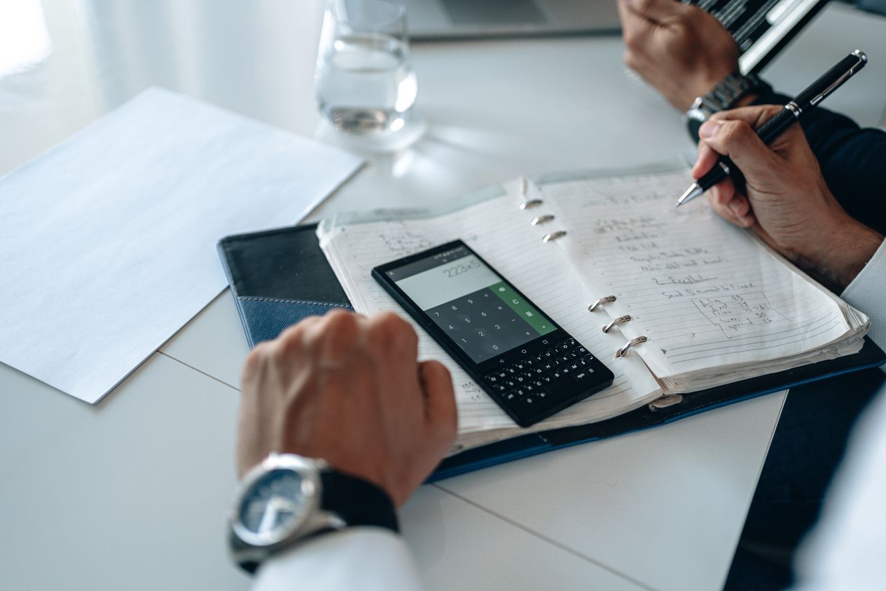 Business professionals reviewing financial information